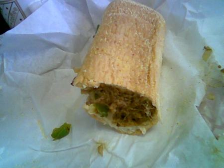 V.T. Famous Philly Cheese Steak, flipped to show cornmeal on roll